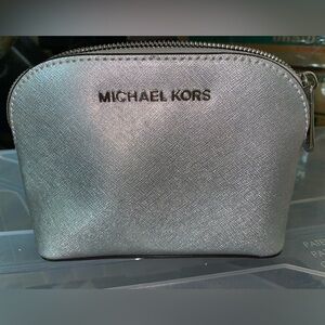 Silver Michael Kors cosmetic bag
